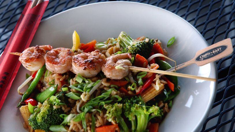 Stir fry veggies and shrimp over rice at Real Chow Baby. / AJC file photo