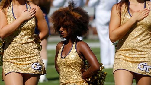 A Raianna Brown kneels during the national anthem prior to the NCAA football game between the Georgia Tech Yellow Jackets and the Miami Hurricanes Oct. 1, 2016 at Bobby Dodd Stadium at Historic Grant Field in Atlanta, GA.