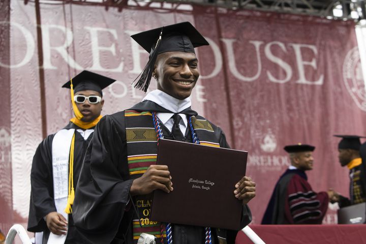 A graduate exits the stage with his degree during the Morehouse College commencement ceremony on Sunday, May 21, 2023, on Century Campus in Atlanta. The graduation marked Morehouse College's 139th commencement program. CHRISTINA MATACOTTA FOR THE ATLANTA JOURNAL-CONSTITUTION