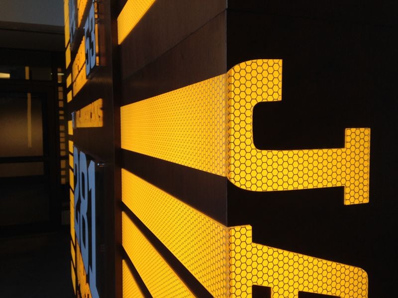 A backlit lighting element in the Georgia Tech football office lobby, complete with honeycomb pattern.