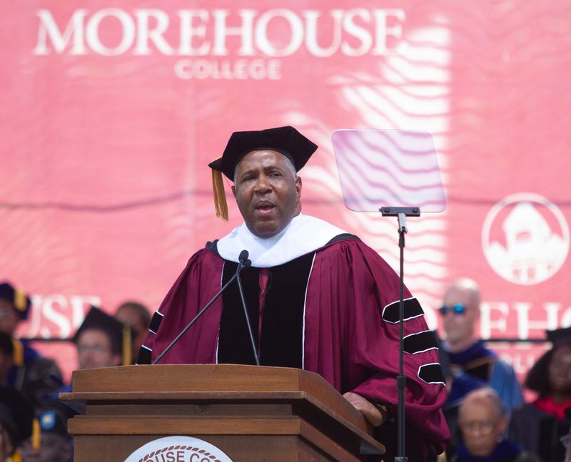Commencement speaker billionaire Robert F. Smith announces he is paying all student debt for the Class of 2019 during the Morehouse College graduation ceremony in Atlanta on Sunday, May 19, 2019. STEVE SCHAEFER / SPECIAL TO THE AJC