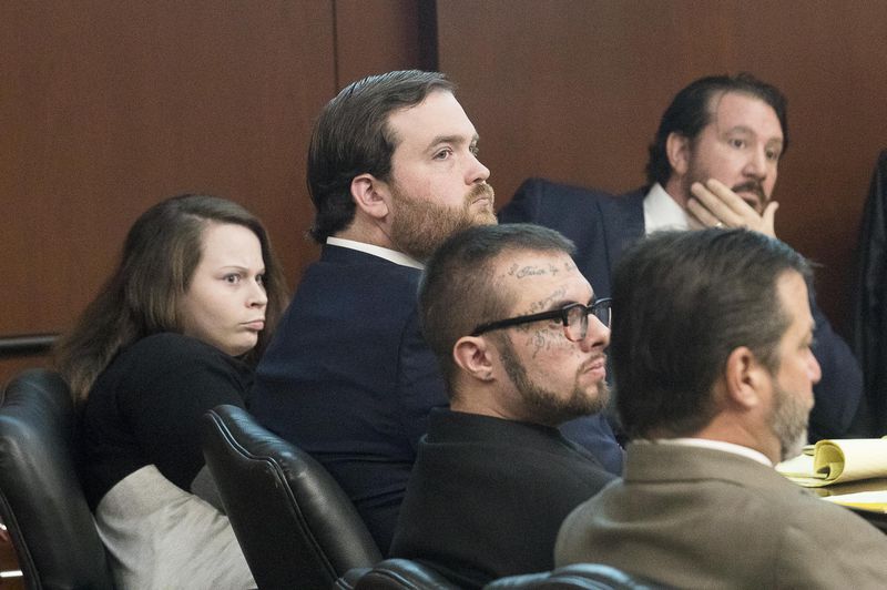 05/13/2019  -- Covington, Georgia -- Cortney Bell (far left) and Christopher McNabb (second from right) sit with their lawyers during their murder trial in front of Georgia Chief Superior Court Judge John M. Ott at the Newton County Courthouse in Covington, Monday, May 13, 2019. (ALYSSA POINTER/ALYSSA.POINTER@AJC.COM)