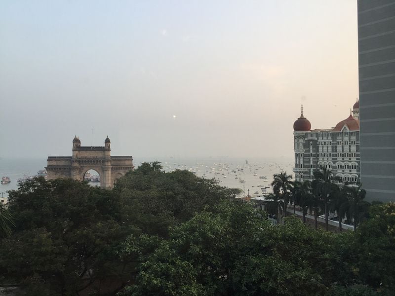“Inside the Mirror” centers on twin sisters living in Bombay (now Mumbai) in the nascent years after Indian independence. The Gateway of India monument was completed there in 1924 to commemorate the landing of George V for his coronation as the Emperor of India in 1911.