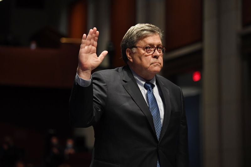 Attorney General William Barr is sworn in to testify before the House Judiciary Committee. (Matt McClain/Pool via The New York Times) 