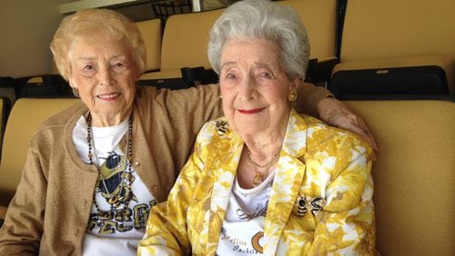 Sisters Jo Atchison (left) and Alae Risse Leitch attended Georgia Tech football games together in nine different decades. They posed for this photograph prior to the Tech-Vanderbilt game at Bobby Dodd Stadium in 2016, when Leitch was 102 and Atchison was 89. (AJC photo by Ken Sugiura)