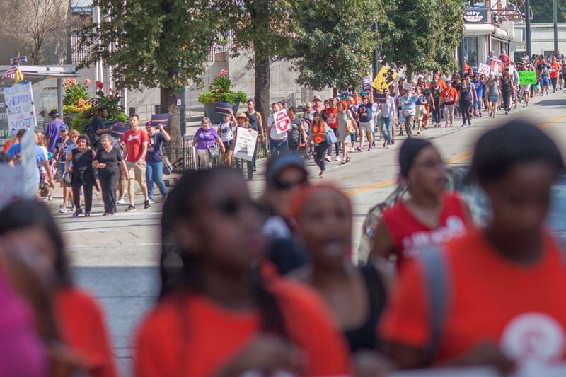 Demonstrators march during a protest in Atlanta ahead of the expected confirmation of Supreme Court nominee Brett Kavanaugh on Saturday, Oct. 6, 2018. (Photo: BRANDEN CAMP/Contributed)