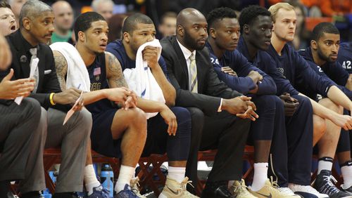 Georgia Tech players react on the bench as Syracuse scores in the final minutes of an NCAA college basketball game in Syracuse, N.Y., Saturday, March 4, 2017. (AP Photo/Nick Lisi)