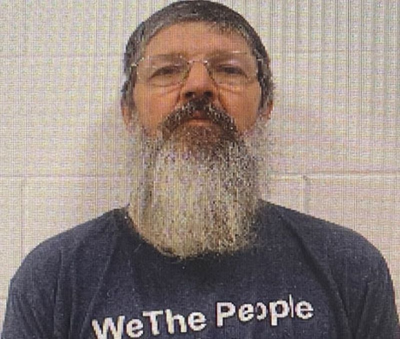 When he was arrested at his farm on March 2, David Fahey was wearing a QAnon T-shirt. He is charged with three counts of cruelty to children in the second degree, one count of cruelty to children in the first degree and three counts of false imprisonment. (Johnson County Sheriff's Office)