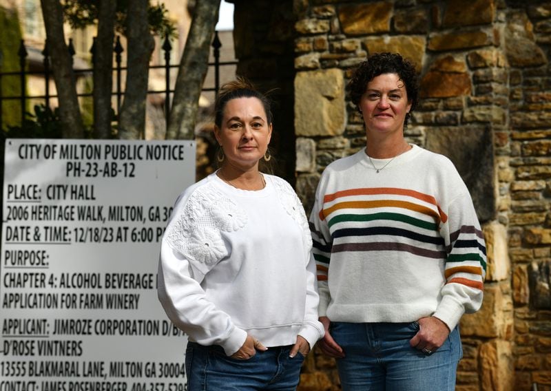 Jessica Buxton and Sarah Moen both live at Providence Plantation subdivision. They are two of a group of neighbors who are opposed to potential approval of an alcohol license for the Rosenbergers farm winery. (Hyosub Shin / Hyosub.Shin@ajc.com)