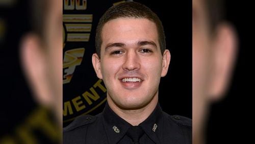 Kevin Valencia, an Orlando police officer who was shot in the head during a deadly standoff at an apartment complex, is now breathing on his own, sources say.