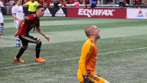 April 28, 2018 Atlanta: Montreal Impact goalkeeper Evan Bush reacts as Atlanta United midfielder Miguel Almiron (left) scores on a penalty kick to tie the game 1-1 during the second half in a MLS soccer game on Saturday, April 28, 2018, in Atlanta.  Curtis Compton/ccompton@ajc.com