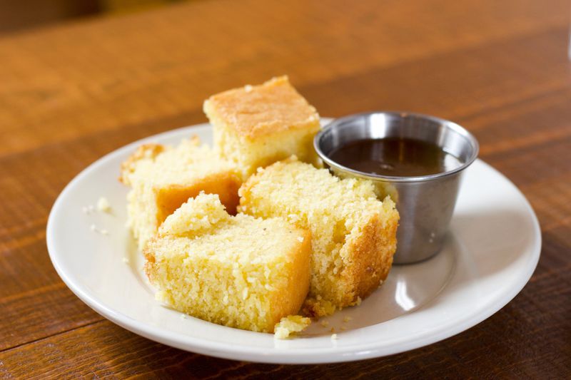 Warm cornbread is served before a meal at Old Lady Gang. CONTRIBUTED BY HENRI HOLLIS