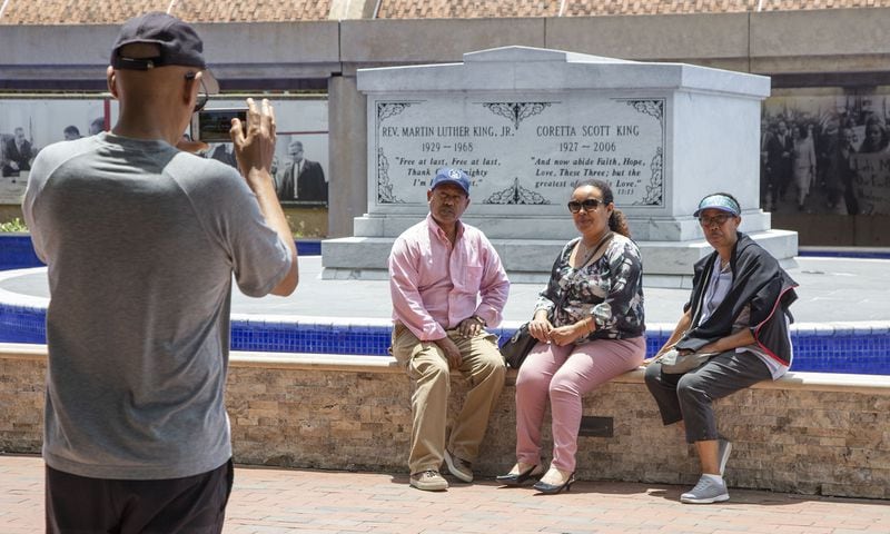 Yeah Beyene (back to camera, from Atlanta) takes a picture of his brother Wolde, sister in-law Meseret & sister Elsi (from Houston) at the Martin Luther King crypt in Atlanta on Thursday May 30th, 2019. 