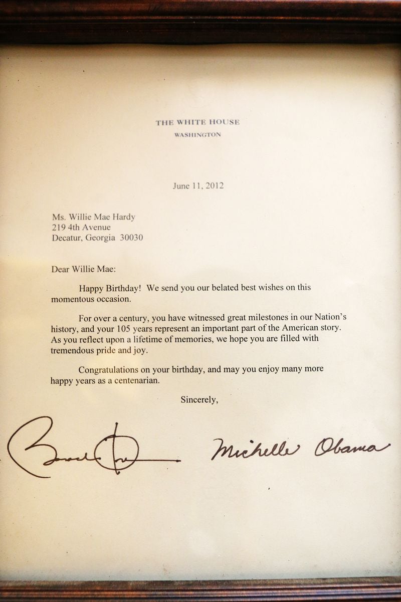 A signed letter from former President Barack Obama to Willie Mae Hardy sent for Hardy's birthday photographed in Decatur, Georgia on Thursday, July 18, 2019. At 111 years old, Hardy is the oldest living African-American in the United States. Hardy was born in 1908 in Junction City, Georgia, and was the granddaughter of a slave. She moved to Atlanta in 1939 looking for a better life for her and her late daughter, Cassie, and has lived in the city ever since. Veronica Edwards, Hardy's granddaughter, is the primary caregiver for Hardy. Hardy had the opportunity to meet former First Lady Michelle Obama during Obama's book tour in May.