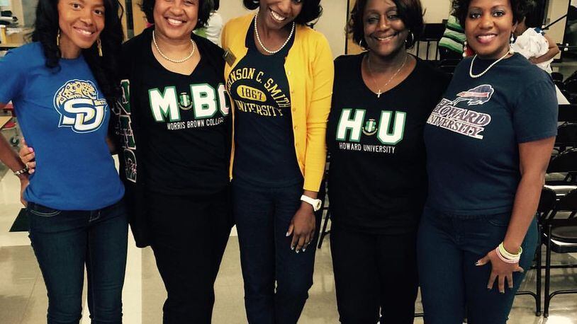 Valencia Bean (pictured second from left) and fellow members of the Alpha Kappa Alpha Sorority show off their HBCU alumni paraphernalia. CONTRIBUTED