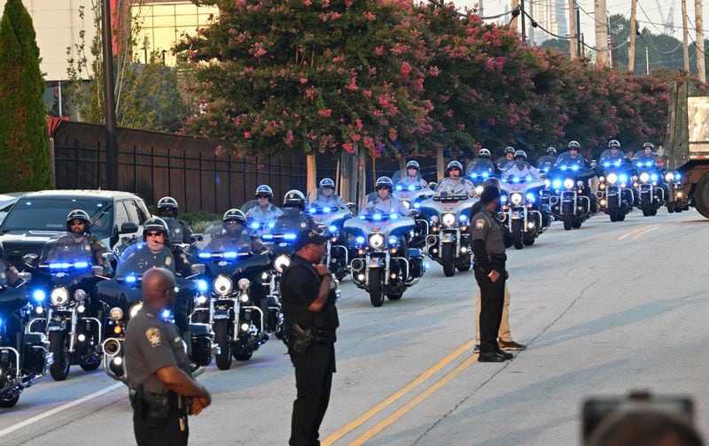 Former President Donald Trump’s motorcades approach the Fulton County Jail, Thursday, August 24, 2023, in Atlanta. (Hyosub Shin / Hyosub.Shin@ajc.com)