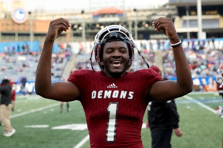 Warner Robins quarterback Jalen Addie (1) celebrates one of his two rushing touchdowns in the first half against Cartersville in the Class 5A state high school football final at Center Parc Stadium Wednesday, December 30, 2020 in Atlanta. JASON GETZ FOR THE ATLANTA JOURNAL-CONSTITUTION