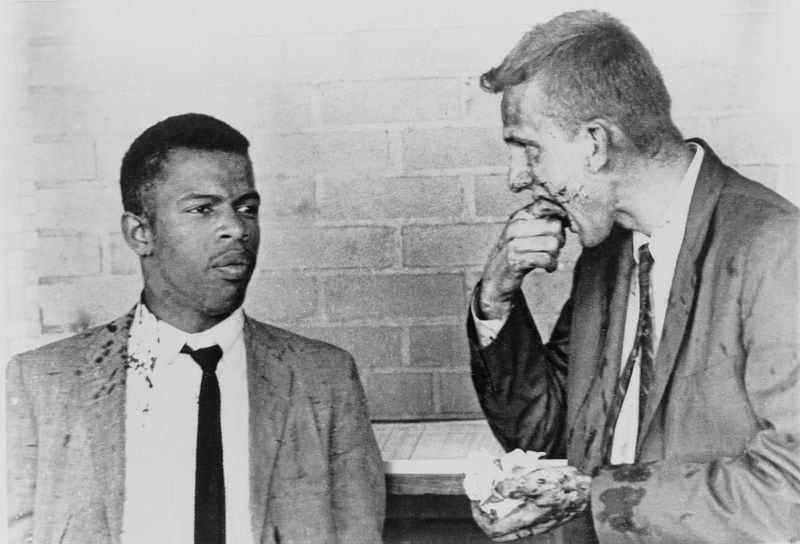 In Montgomery, the Freedom Riders were met by another angry mob, and several, including John Lewis, left, and Jim Zwerg, right, a white college student, were seriously injured. (Alamy Stock Photo)