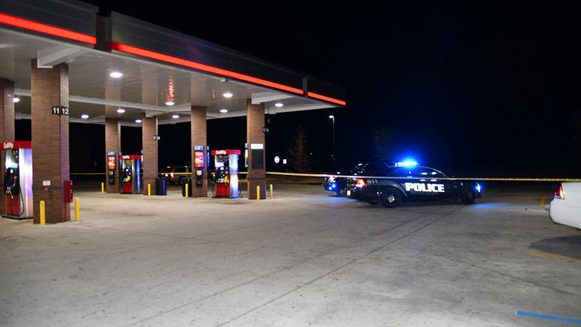A man died in a shootout Saturday night outside a QuikTrip at the corner of Flat Shoals Parkway and Clifton Springs Road.