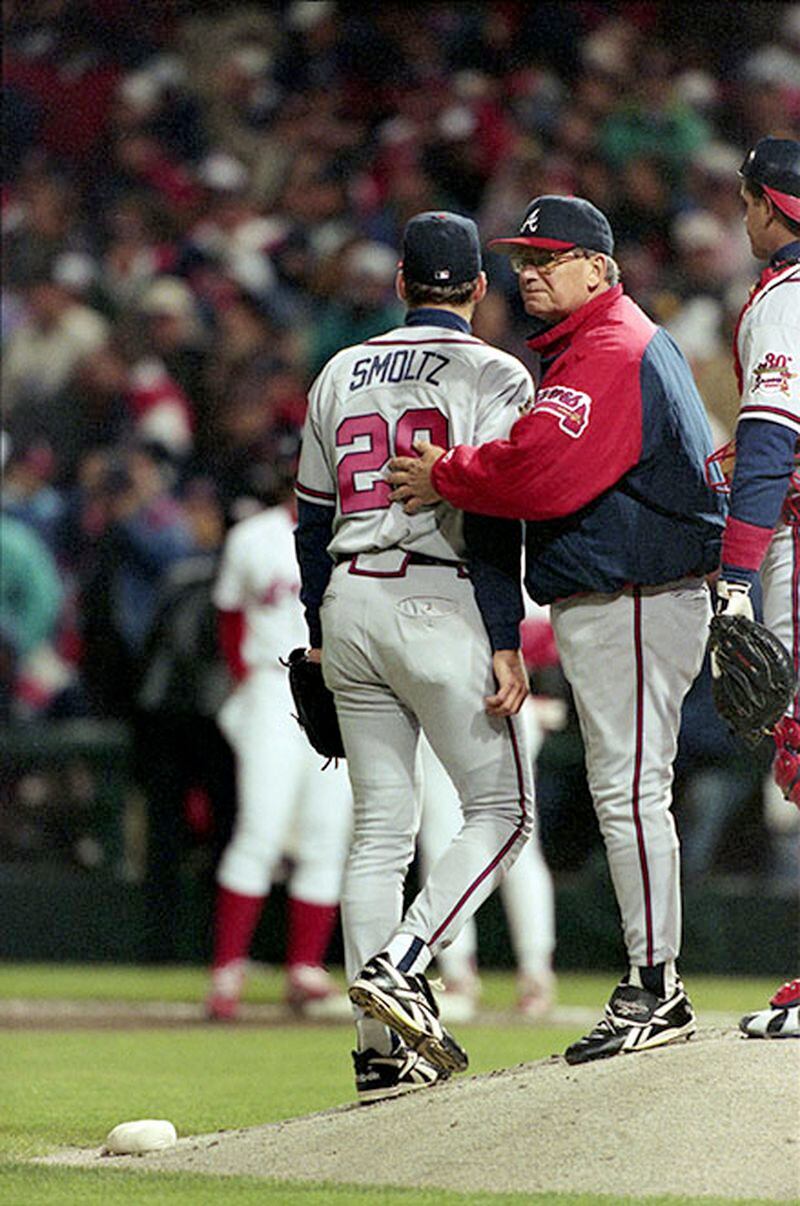 Bobby Cox pulls John Smoltz after a disastrous start in Game 3 of the World Series, Oct. 24, 1995, in Cleveland.