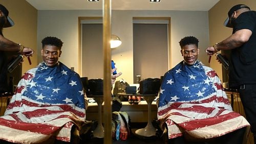 De'Andre Hunter receives a haircut as he prepares for the 2019 NBA Draft on June 20, 2019 in New York City. (Photo by Mike Coppola/Getty Images for Wasserman)