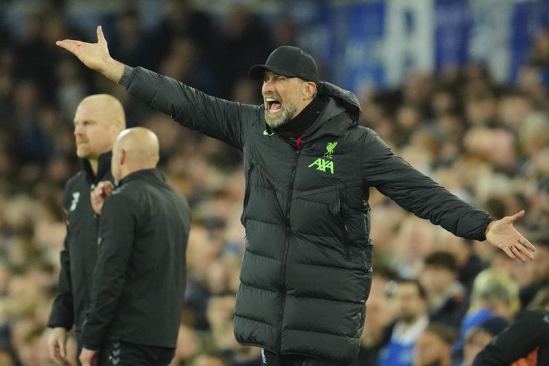 Liverpool's manager Jurgen Klopp yells during the English Premier League soccer match between Everton and Liverpool at the Goodison Park stadium in Liverpool, Britain, Wednesday, April 24, 2024. (AP Photo/Jon Super)