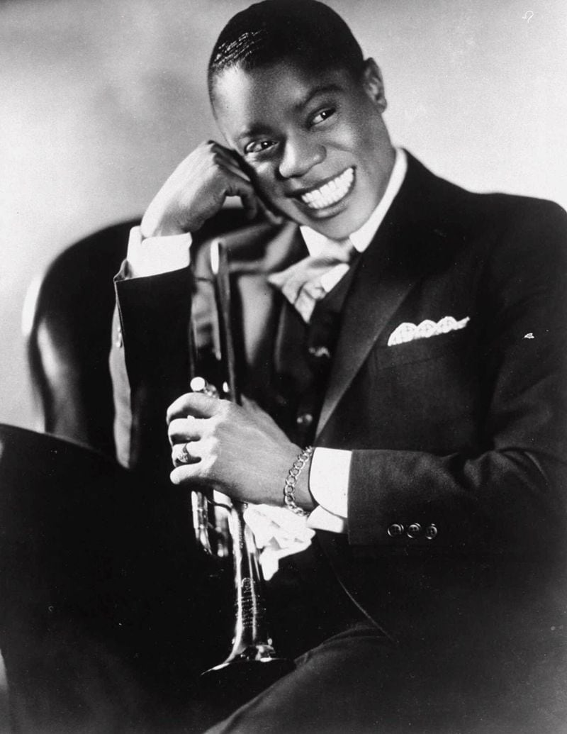 Louis Armstrong smiles in this 1932 portrait, made in Chicago to promote Armstrong’s first European tour. AP FILE PHOTO