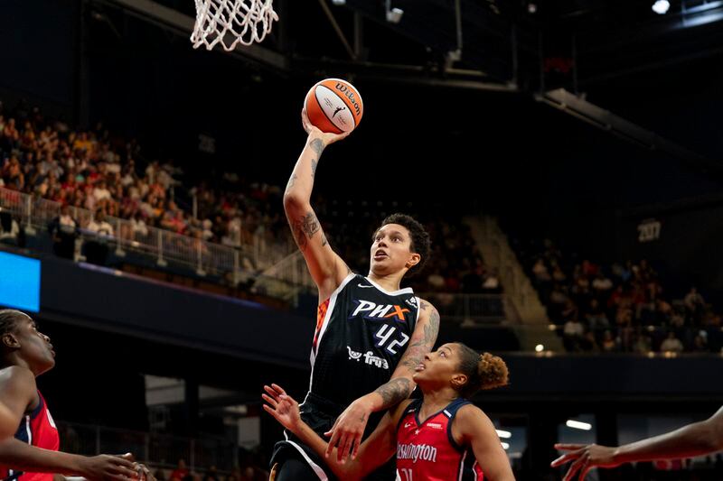 FILE - Phoenix Mercury center Brittney Griner (42) makes a layup during the second quarter of a WNBA basketball game against the Washington Mystics, July 23, 2023, in Washington. Griner continues her efforts to settle into a normal routine following her release from a Russian prison 17 months ago. (AP Photo/Stephanie Scarbrough, File)