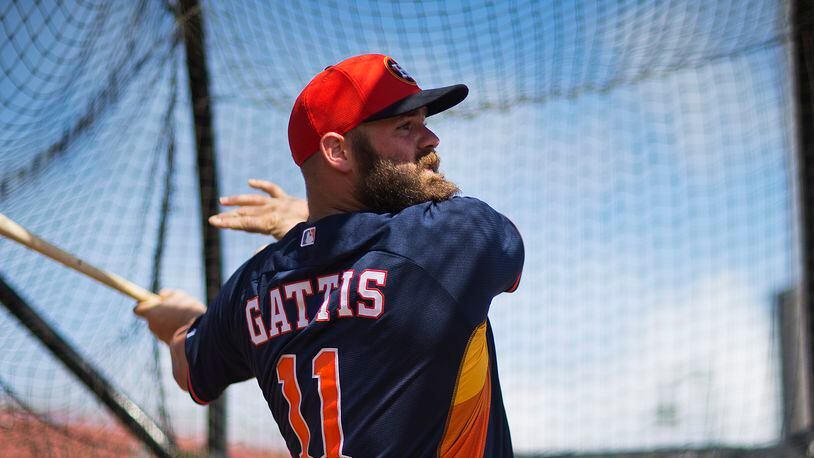 Houston Astros' Evan Gattis takes batting practice during a spring training baseball workout, Tuesday, March 3, 2015, in Kissimmee, Fla. (AP Photo/David Goldman)