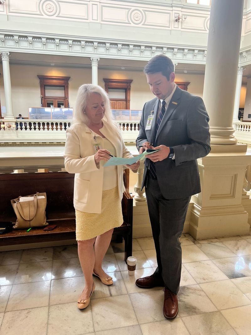 Georgia Restaurant Association President and CEO Karen Bremer confers at the state Capitol with Scott Bierman, GRA's vice president of government affairs. Courtesy of Karen Bremer