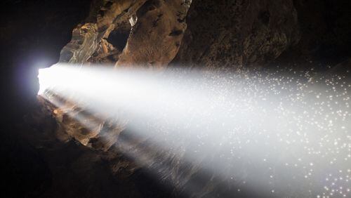 Light filters into a cave, which is not the one in Cleveland, Virginia, where five trapped men were rescued Sunday.
