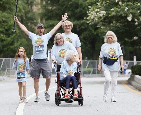 Five generations of the Wilson Family take part in the 54th running of the Atlanta Journal-Constitution Peachtree Road Race in Atlanta on Atlanta on Tuesday, July 4th, 2023.   (Miguel Martinez / Miguel.Martinezjimenez@ajc.com)