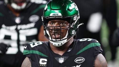 Steve McLendon (99) of the New York Jets looks on during warm-ups against the Denver Broncos on Oct. 1, 2020 at MetLife Stadium in East Rutherford, New Jersey. The Jets traded McLendon to the Tampa Bay Buccaneers. (Elsa/Getty Images/TNS)