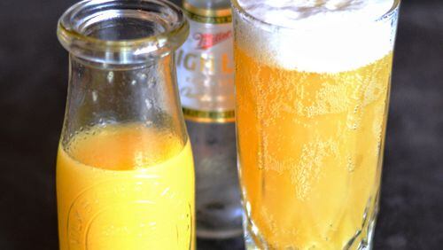 The redneck mimosa, a staple on One Eared Stag’s brunch menu, is made with fresh squeezed orange juice and Miller High Life. (Henri Hollis)