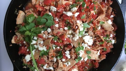 Low-carb tortillas and fresh pico de gallo lighten chilaquiles, a weeknight favorite. CONTRIBUTED BY KELLIE HYNES