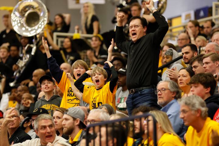 Kennesaw State fans cheer for their team at the end of the second half.
 Miguel Martinez / miguel.martinezjimenez@ajc.com