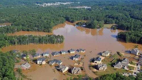 With Austell shown here during the September 2009 flood and with all that our neighbors in the Carolinas are enduring from Hurricane Florence, an online tool is available at Georgiadfirm.com to check on whether or not you live in a Special Flood Hazard Area. AJC file photo