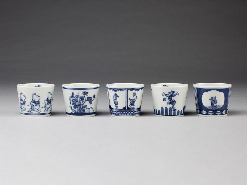 Some of the High Museum’s exhibit looks at marketing, such as Winnie-the-Pooh sake cups made by Hasami for the Walt Disney Co., circa 2014. CONTRIBUTED BY VICTORIA AND ALBERT MUSEUM, LONDON