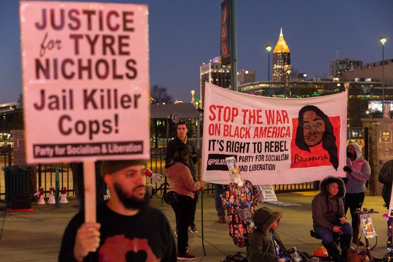 Activists take part in an Atlanta protest against the death of Tyre Nichols and police brutality on Friday, January 27, 2023. (Arvin Temkar / arvin.temkar@ajc.com)