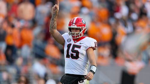 Georgia quarterback Carson Beck (15) celebrates a touchdown pass to Georgia tight end Brock Bowers (not pictured) during the first quarter against the Tennessee at Neyland Stadium, Saturday, November 18, 2023, in Knoxville, Tn. The Bulldogs won 38-10.  (Jason Getz / Jason.Getz@ajc.com)