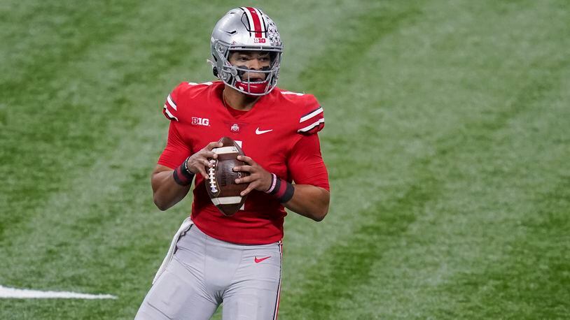 Ohio State quarterback Justin Fields drops back to pass during the first half of the Big Ten championship against Northwestern, Saturday, Dec. 19, 2020, in Indianapolis. (Darron Cummings/AP)