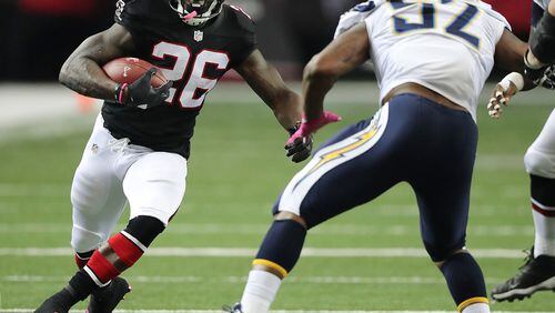 October 23, 2016 Atlanta: Falcons running back Tevin Coleman runs for yardage against the Chargers during the first half in an NFL football game on Sunday, Oct. 23, 2016, in Atlanta. Coleman did not play in the second half due to a hamstring injury. Curtis Compton /ccompton@ajc.com