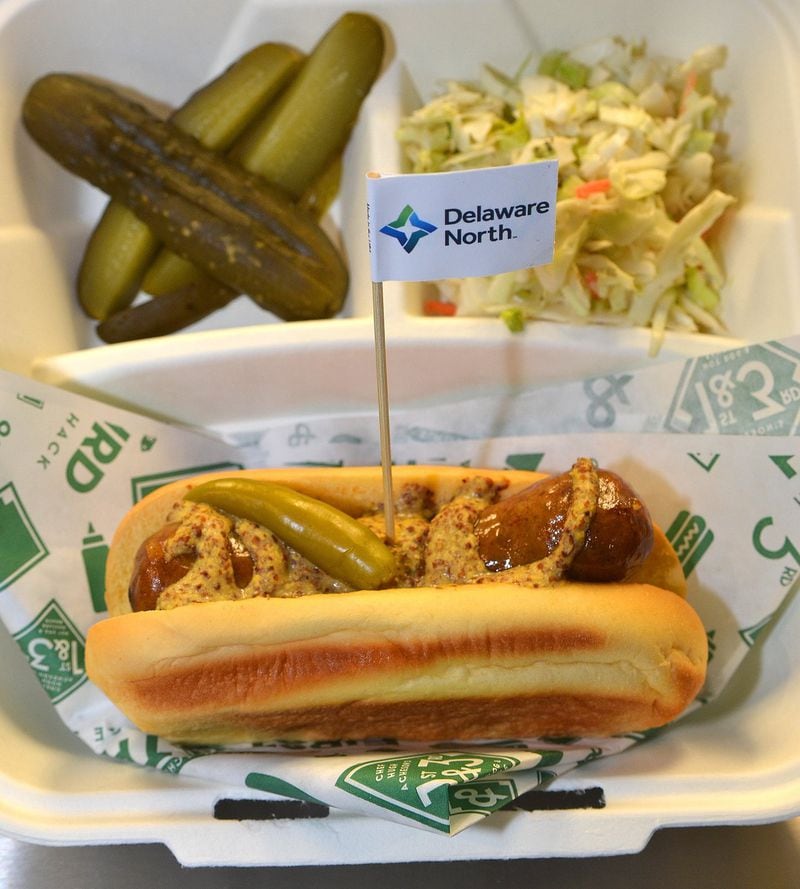 The German bratwurst is a tasty option from Hugh Acheson’s First & Third Hot Dog and Sausage Shack at SunTrust Park. CHRIS HUNT / SPECIAL