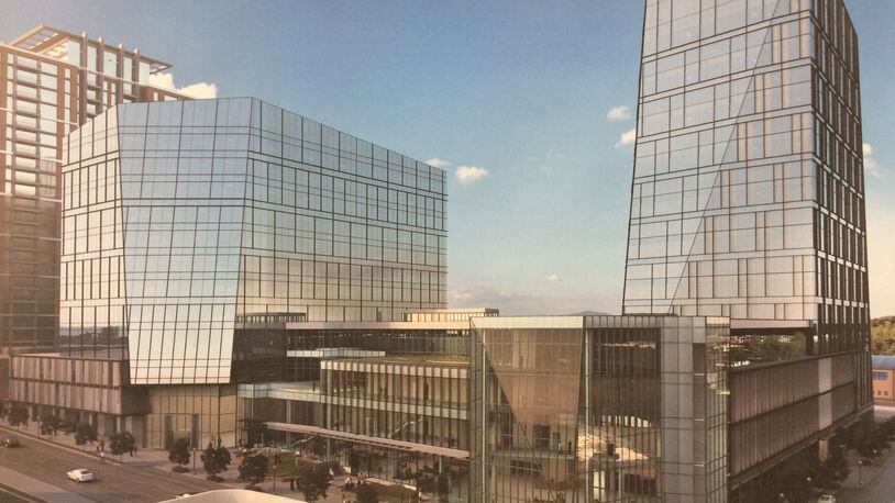 This rendering shows the two phases of Spring and 8th Street, the headquarters campus of NCR. The first tower, a 20-story office building to the right, is under construction. The smaller tower to the left is being designed. Source: Cousins Properties, NCR, Duda Paine Architects, HKS and Kimley-Horn