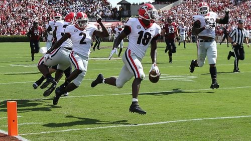 Georgia defensive back Deandre Baker drops the ball just short of the end zone as he returns an interception off  South Carolina quarterback Jake Bentley Saturday, Sept 8, 2018, in Columbia, S.C.