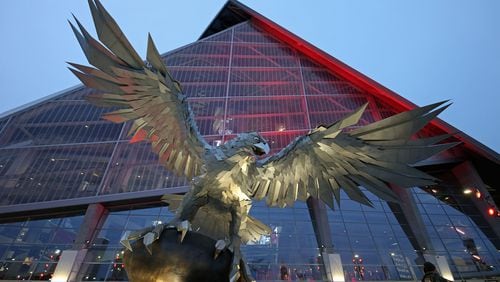 Mercedes-Benz Stadium has a massive falcon scuplture on its “front porch.”