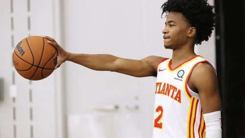 Atlanta Hawks draftee Sharife Cooper, the 48th overall pick, poses for team photos after his introductory press conference on Friday, July 30, 2021, in Atlanta.   Curtis Compton / Curtis.Compton@ajc.com
