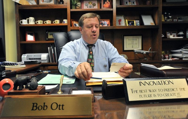 Commissioner Bob Ott works in his office at the Cobb County Government building in Marietta. 