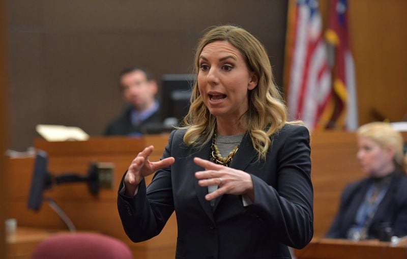 March 13, 2018 Atlanta - Defense attorney Amanda Clark Palmer makes an opening statement to members of the jury during the first day of trial for Tex McIver before Fulton County Chief Judge Robert McBurney on Tuesday, March 13, 2018. HYOSUB SHIN / HSHIN@AJC.COM