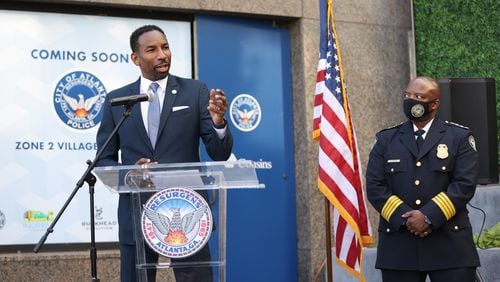 Atlanta Mayor Andre Dickens stands with Atlanta Chief Police Rodney Bryant during the unveiling of the new Buckhead mini-precinct. Thursday, January 13, 2022. Miguel Martinez for The Atlanta Journal-Constitution 